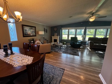 Welcome to this beautifully maintained and fully remodeled home on Hamptons Golf Club in Florida - for sale on GolfHomes.com, golf home, golf lot