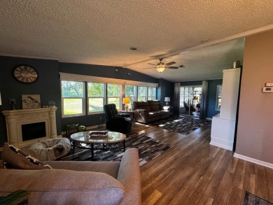 Welcome to this beautifully maintained and fully remodeled home on Hamptons Golf Club in Florida - for sale on GolfHomes.com, golf home, golf lot
