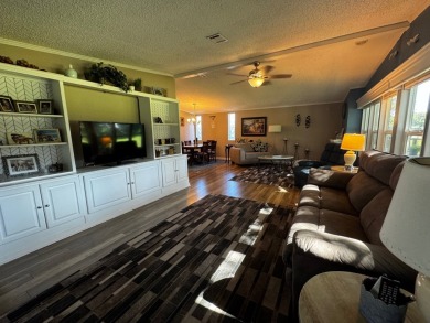 Welcome to this beautifully maintained and fully remodeled home on Hamptons Golf Club in Florida - for sale on GolfHomes.com, golf home, golf lot