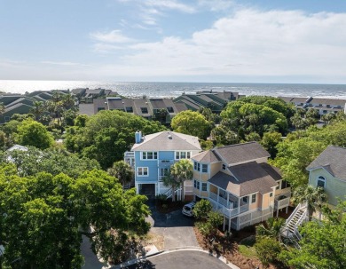 Just bring your suitcase - this turnkey home is tucked away in a on Wild Dunes Harbor Golf Resort in South Carolina - for sale on GolfHomes.com, golf home, golf lot