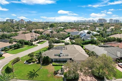 Ideally situated on a quiet street in Pelican Bay Woods, just on Club at Pelican Bay Golf Course in Florida - for sale on GolfHomes.com, golf home, golf lot