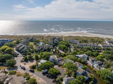 Just bring your suitcase - this turnkey home is tucked away in a on Wild Dunes Harbor Golf Resort in South Carolina - for sale on GolfHomes.com, golf home, golf lot