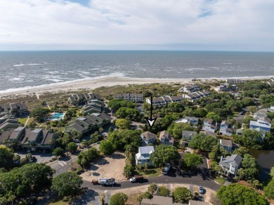 Just bring your suitcase - this turnkey home is tucked away in a on Wild Dunes Harbor Golf Resort in South Carolina - for sale on GolfHomes.com, golf home, golf lot