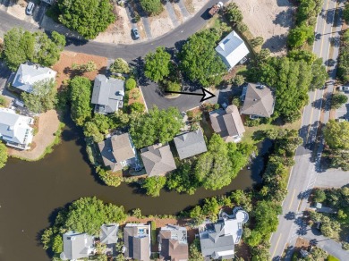 Just bring your suitcase - this turnkey home is tucked away in a on Wild Dunes Harbor Golf Resort in South Carolina - for sale on GolfHomes.com, golf home, golf lot