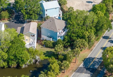 Just bring your suitcase - this turnkey home is tucked away in a on Wild Dunes Harbor Golf Resort in South Carolina - for sale on GolfHomes.com, golf home, golf lot