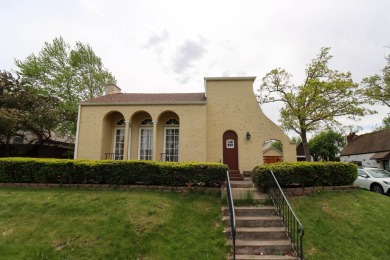 Surrounded by lakes and located on a golf course, this home is on Nippersink Golf Resort in Wisconsin - for sale on GolfHomes.com, golf home, golf lot