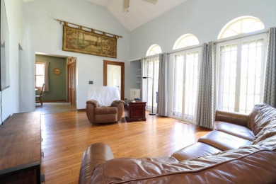 Surrounded by lakes and located on a golf course, this home is on Nippersink Golf Resort in Wisconsin - for sale on GolfHomes.com, golf home, golf lot
