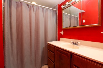 Surrounded by lakes and located on a golf course, this home is on Nippersink Golf Resort in Wisconsin - for sale on GolfHomes.com, golf home, golf lot