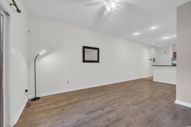 Enjoy easy coastal living in this beautifully updated 2-bedroom on Indian Wells Golf Course in South Carolina - for sale on GolfHomes.com, golf home, golf lot