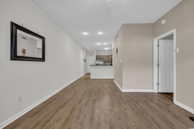 Enjoy easy coastal living in this beautifully updated 2-bedroom on Indian Wells Golf Course in South Carolina - for sale on GolfHomes.com, golf home, golf lot
