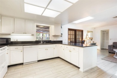 Located in the highly desirable Tuscawilla community, this home on Tuscawilla Country Club in Florida - for sale on GolfHomes.com, golf home, golf lot
