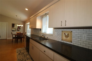 Well maintained ranch styled home is located closer to the front on Eagle Ridge At Spruce Creek Country Club in Florida - for sale on GolfHomes.com, golf home, golf lot