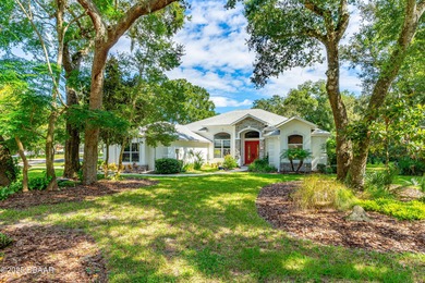 Stunning Halifax Plantation golf course custom pool home on a on Halifax Plantation Golf Club in Florida - for sale on GolfHomes.com, golf home, golf lot