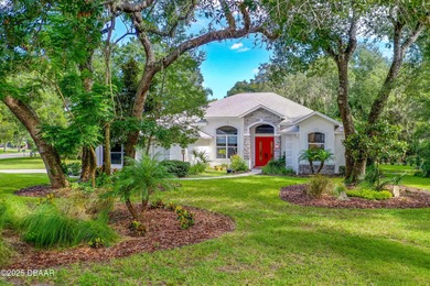 Stunning Halifax Plantation golf course custom pool home on a on Halifax Plantation Golf Club in Florida - for sale on GolfHomes.com, golf home, golf lot
