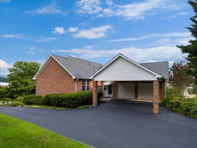 Stunning, single-level brick residence nestled within the on Pete Dye River Course of Virginia Tech in Virginia - for sale on GolfHomes.com, golf home, golf lot