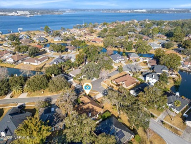 This lovely home is clean, well built, spacious, filled with on Blue Cypress Golf Club in Florida - for sale on GolfHomes.com, golf home, golf lot