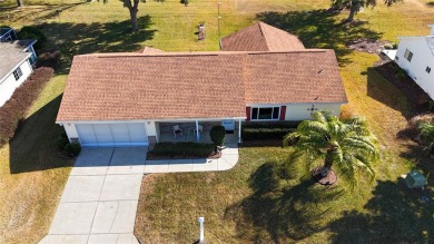 Well maintained ranch styled home is located closer to the front on Eagle Ridge At Spruce Creek Country Club in Florida - for sale on GolfHomes.com, golf home, golf lot