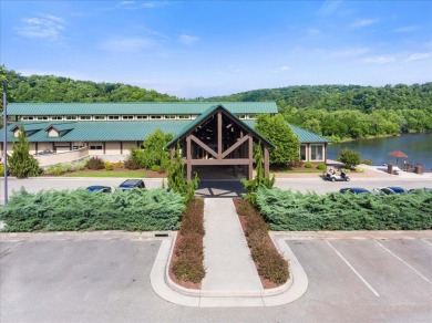 Stunning, single-level brick residence nestled within the on Pete Dye River Course of Virginia Tech in Virginia - for sale on GolfHomes.com, golf home, golf lot