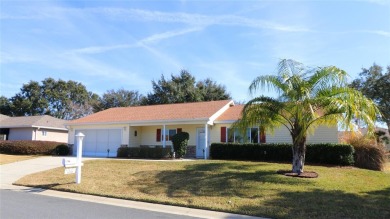 Well maintained ranch styled home is located closer to the front on Eagle Ridge At Spruce Creek Country Club in Florida - for sale on GolfHomes.com, golf home, golf lot