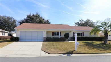 Well maintained ranch styled home is located closer to the front on Eagle Ridge At Spruce Creek Country Club in Florida - for sale on GolfHomes.com, golf home, golf lot