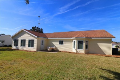 Well maintained ranch styled home is located closer to the front on Eagle Ridge At Spruce Creek Country Club in Florida - for sale on GolfHomes.com, golf home, golf lot