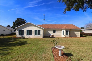 Well maintained ranch styled home is located closer to the front on Eagle Ridge At Spruce Creek Country Club in Florida - for sale on GolfHomes.com, golf home, golf lot