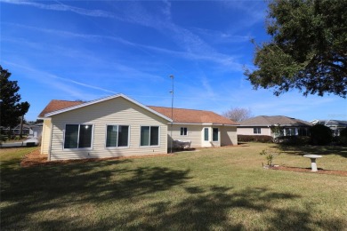 Well maintained ranch styled home is located closer to the front on Eagle Ridge At Spruce Creek Country Club in Florida - for sale on GolfHomes.com, golf home, golf lot