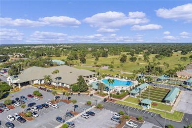 Well maintained ranch styled home is located closer to the front on Eagle Ridge At Spruce Creek Country Club in Florida - for sale on GolfHomes.com, golf home, golf lot