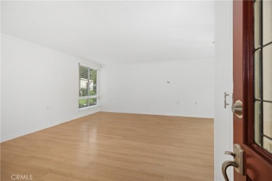 Sun-splashed Barcelona end unit with leafy outlooks, a private on Laguna Woods Village Golf Course in California - for sale on GolfHomes.com, golf home, golf lot