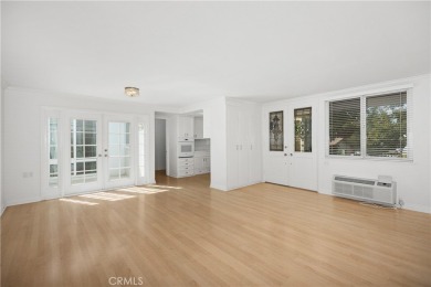 Sun-splashed Barcelona end unit with leafy outlooks, a private on Laguna Woods Village Golf Course in California - for sale on GolfHomes.com, golf home, golf lot