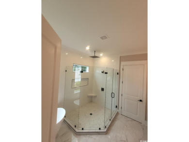 Check out the private wooded view of this immensely grand home! on Myrtlewood Golf Course and Club  in South Carolina - for sale on GolfHomes.com, golf home, golf lot