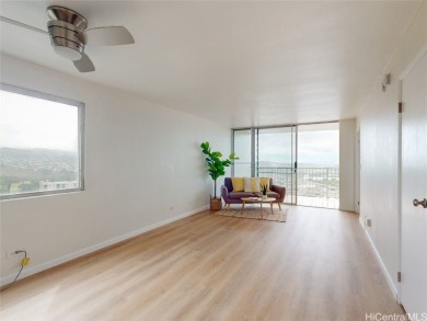 Discover this high-floor, fully remodeled corner end unit that's on Pearl Country Club in Hawaii - for sale on GolfHomes.com, golf home, golf lot