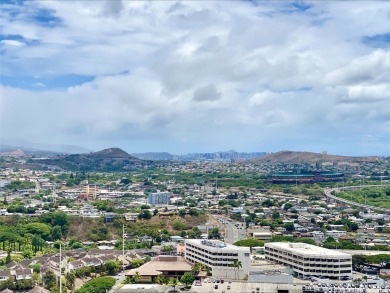 Discover this high-floor, fully remodeled corner end unit that's on Pearl Country Club in Hawaii - for sale on GolfHomes.com, golf home, golf lot