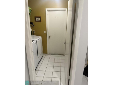 Well maintained and very spacious 3/2.5 townhome in Woodmont on  in Florida - for sale on GolfHomes.com, golf home, golf lot