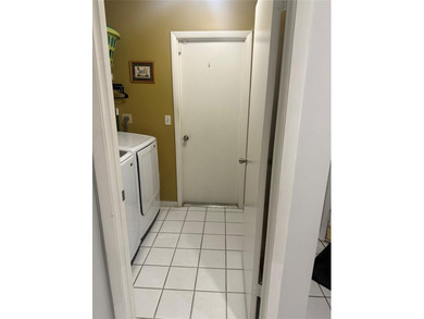 Well maintained and very spacious 3/2.5 townhome in Woodmont on  in Florida - for sale on GolfHomes.com, golf home, golf lot