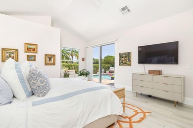 Nestled within a prestigious, gated community, this model on Ironhorse Country Club in Florida - for sale on GolfHomes.com, golf home, golf lot