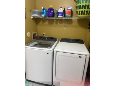 Well maintained and very spacious 3/2.5 townhome in Woodmont on  in Florida - for sale on GolfHomes.com, golf home, golf lot