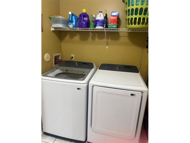 Well maintained and very spacious 3/2.5 townhome in Woodmont on  in Florida - for sale on GolfHomes.com, golf home, golf lot