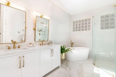 Nestled within a prestigious, gated community, this model on Ironhorse Country Club in Florida - for sale on GolfHomes.com, golf home, golf lot