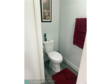 Well maintained and very spacious 3/2.5 townhome in Woodmont on  in Florida - for sale on GolfHomes.com, golf home, golf lot
