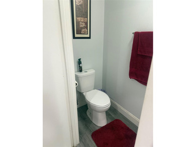 Well maintained and very spacious 3/2.5 townhome in Woodmont on  in Florida - for sale on GolfHomes.com, golf home, golf lot