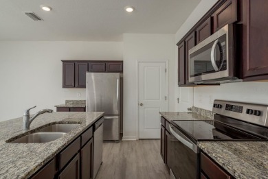 Move-in ready and like brand new!

Built less than four years on The Links of Lake Bernadette in Florida - for sale on GolfHomes.com, golf home, golf lot