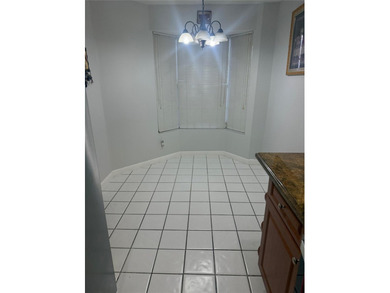 Well maintained and very spacious 3/2.5 townhome in Woodmont on  in Florida - for sale on GolfHomes.com, golf home, golf lot