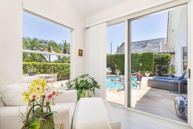 Nestled within a prestigious, gated community, this model on Ironhorse Country Club in Florida - for sale on GolfHomes.com, golf home, golf lot