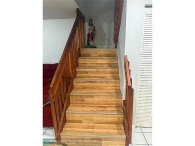 Well maintained and very spacious 3/2.5 townhome in Woodmont on  in Florida - for sale on GolfHomes.com, golf home, golf lot