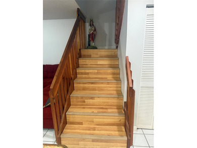 Well maintained and very spacious 3/2.5 townhome in Woodmont on  in Florida - for sale on GolfHomes.com, golf home, golf lot