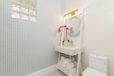 Nestled within a prestigious, gated community, this model on Ironhorse Country Club in Florida - for sale on GolfHomes.com, golf home, golf lot