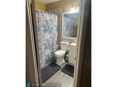 Well maintained and very spacious 3/2.5 townhome in Woodmont on  in Florida - for sale on GolfHomes.com, golf home, golf lot