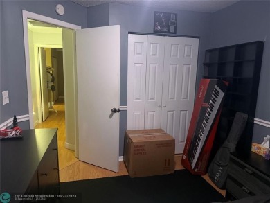 Well maintained and very spacious 3/2.5 townhome in Woodmont on  in Florida - for sale on GolfHomes.com, golf home, golf lot