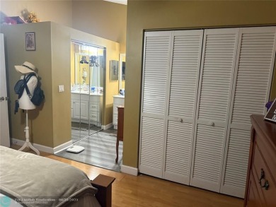 Well maintained and very spacious 3/2.5 townhome in Woodmont on  in Florida - for sale on GolfHomes.com, golf home, golf lot